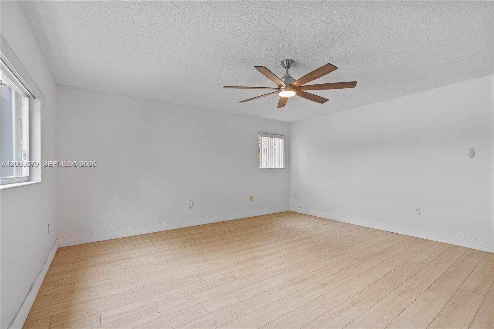 237 Northwest 100th Avenue Plantation, FL 33324 - Photo 53 of 86 wooden floor in an empty room with a window