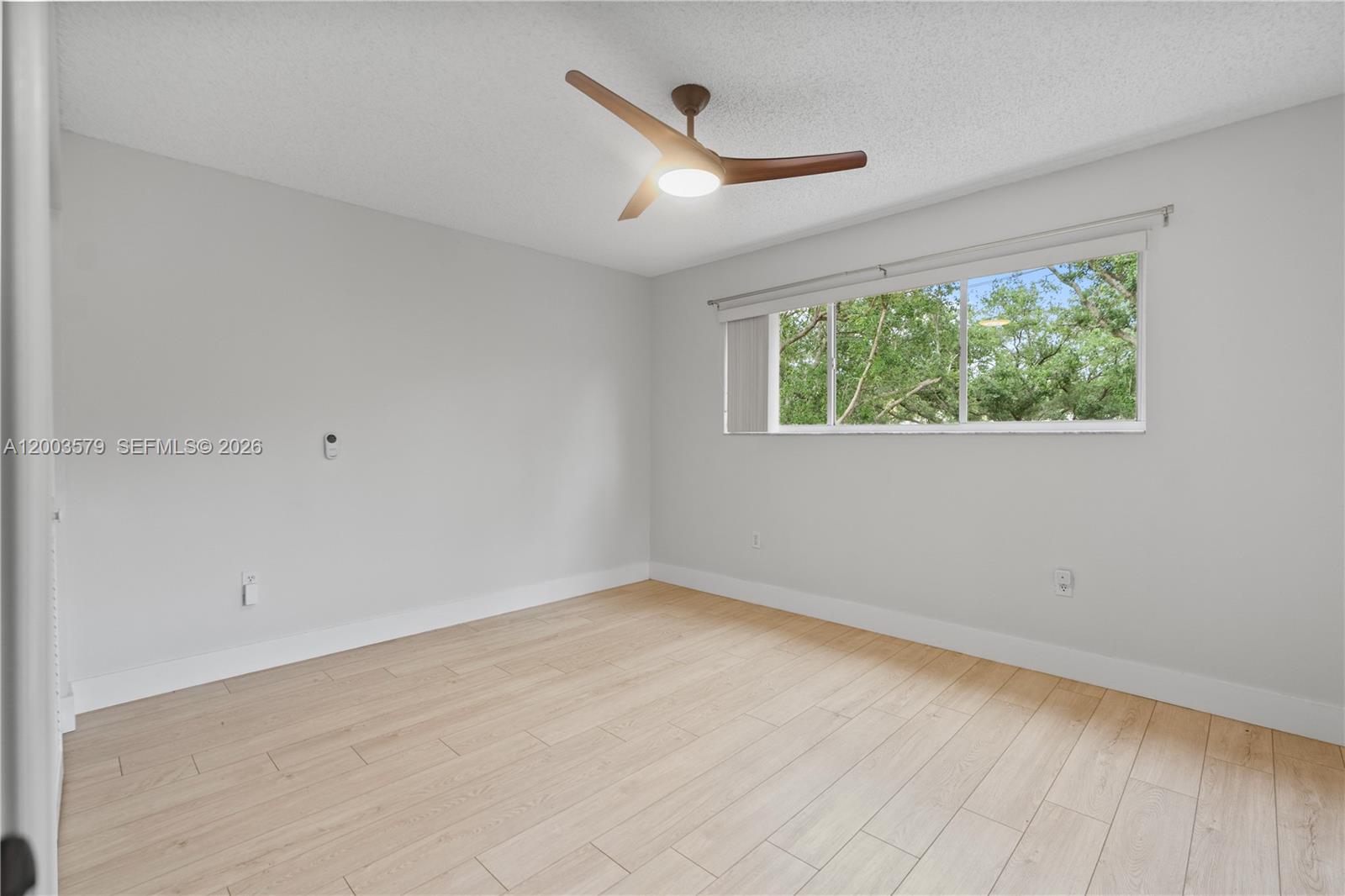 237 Northwest 100th Avenue Plantation, FL 33324 - Photo 62 of 86 an empty room with a window