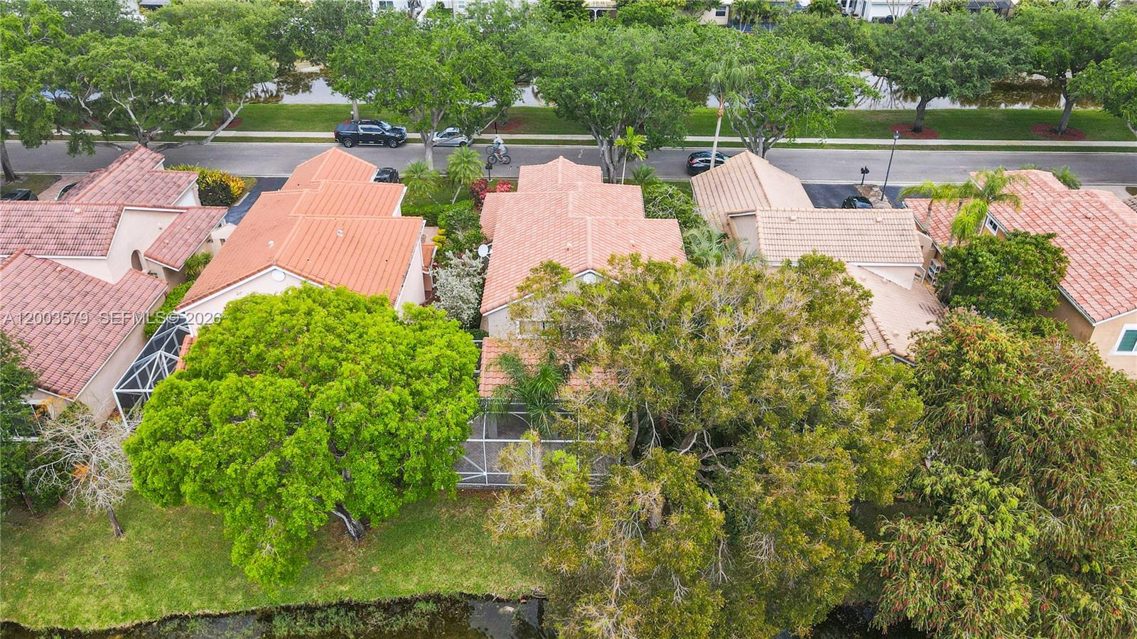 237 Northwest 100th Avenue Plantation, FL 33324 - Photo 71 of 86 an aerial view of a house with outdoor space lake and trees all around