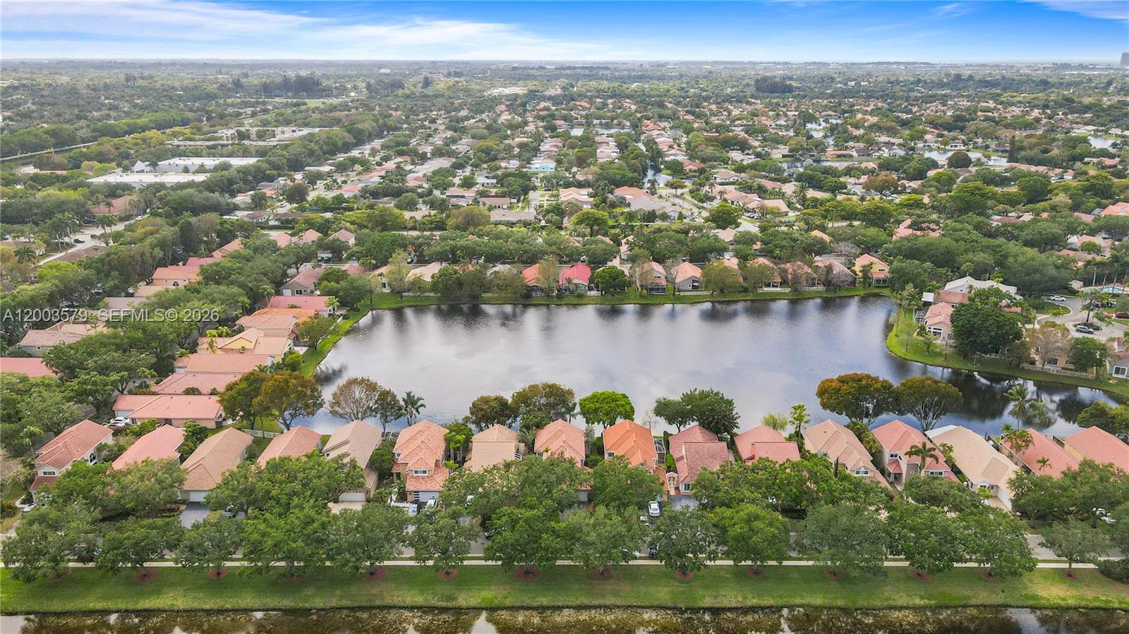 237 Northwest 100th Avenue Plantation, FL 33324 - Photo 75 of 86 an aerial view of residential houses with outdoor space and lake view
