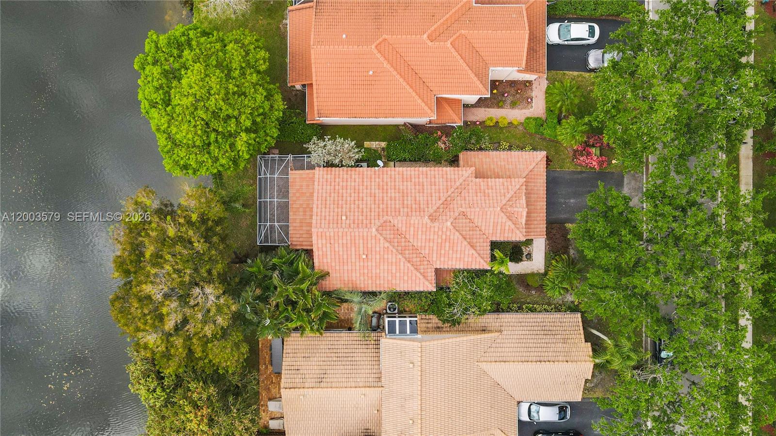 237 Northwest 100th Avenue Plantation, FL 33324 - Photo 84 of 86 an aerial view of a house with a garden and a building
