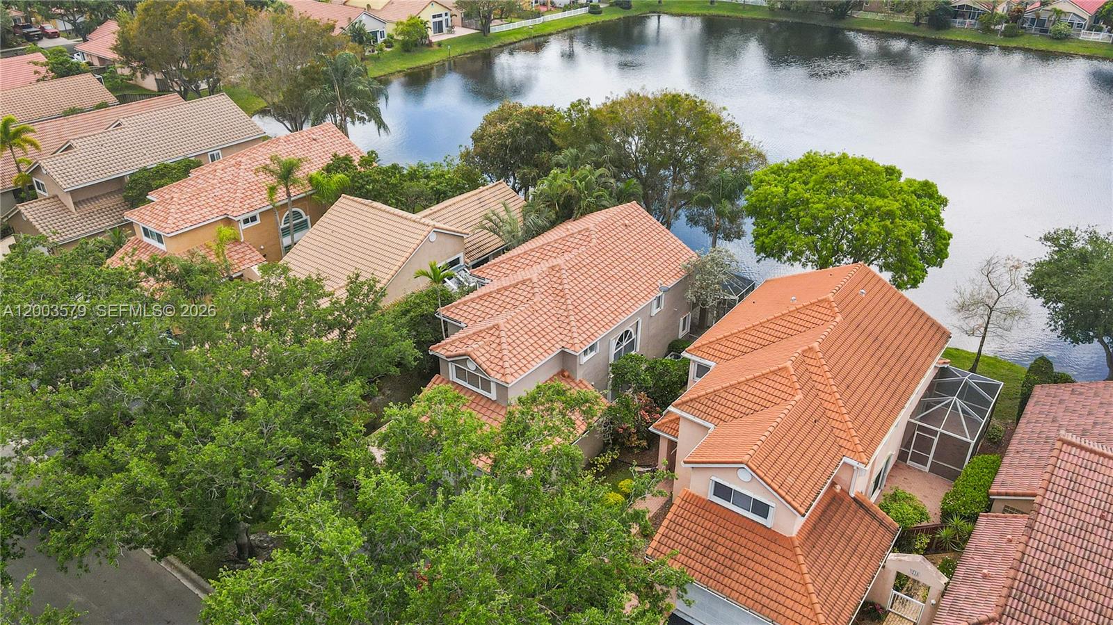237 Northwest 100th Avenue Plantation, FL 33324 - Photo 85 of 86 an aerial view of a house with outdoor space and lake view