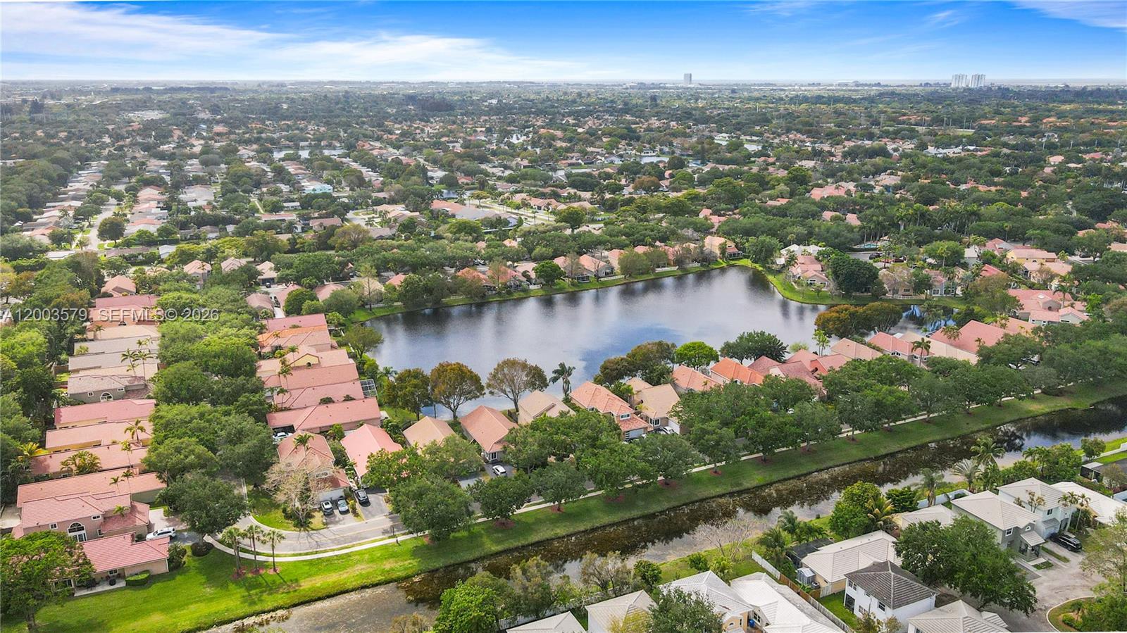 237 Northwest 100th Avenue Plantation, FL 33324 - Photo 86 of 86 an aerial view of a city with lots of residential buildings lake and ocean view