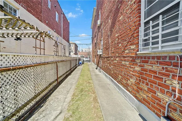 a view of balcony with wooden floor