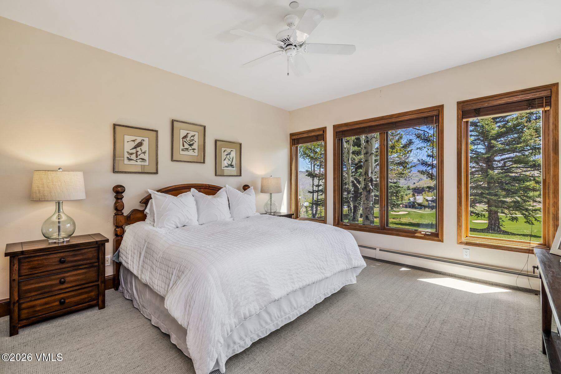 167 Saddle Ridge Edwards, CO 81632 - Photo 22 of 41 a large bed sitting in a bedroom next to a window