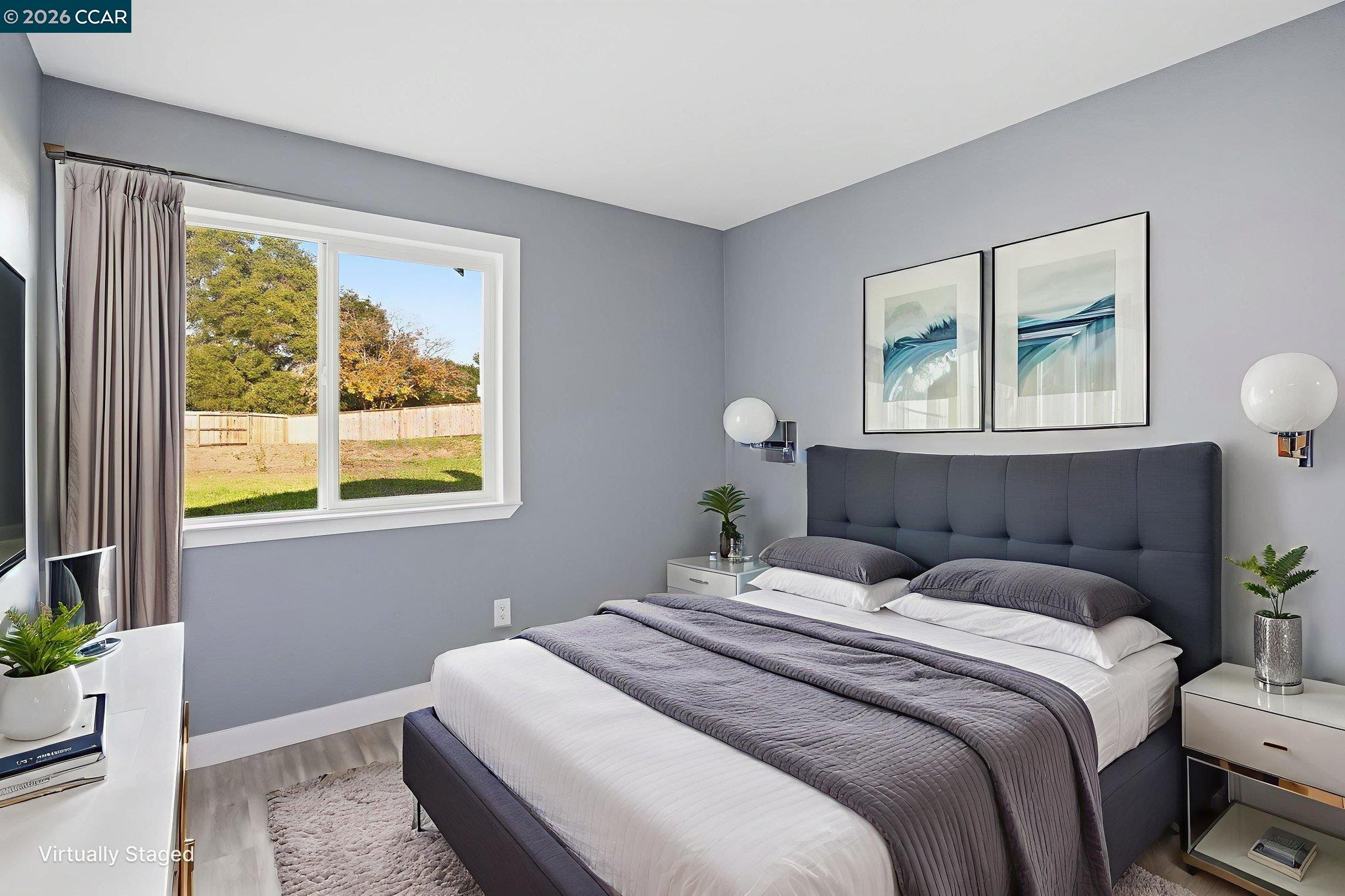 834 Coral Ridge Circle Rodeo, CA 94572 - Photo 17 of 32 a bedroom with a bed and a window