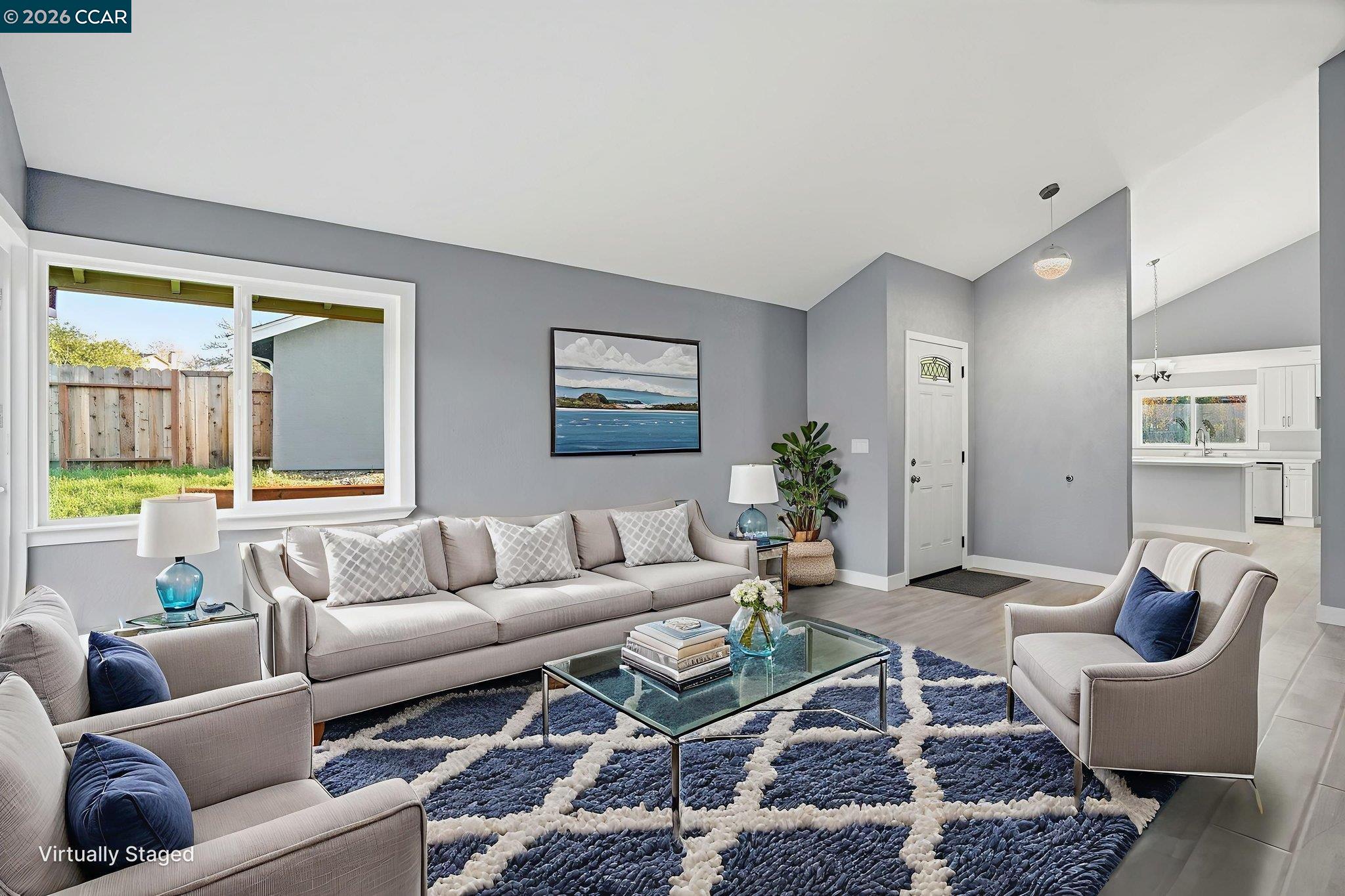 834 Coral Ridge Circle Rodeo, CA 94572 - Photo 4 of 32 a living room with furniture rug and window
