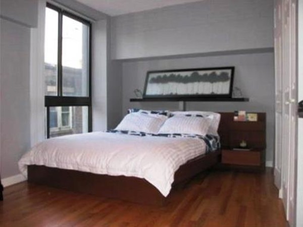 12 Stoneholm Street, Unit 520 Boston, MA 02115 - Photo 12 of 27 a bedroom with a bed and window