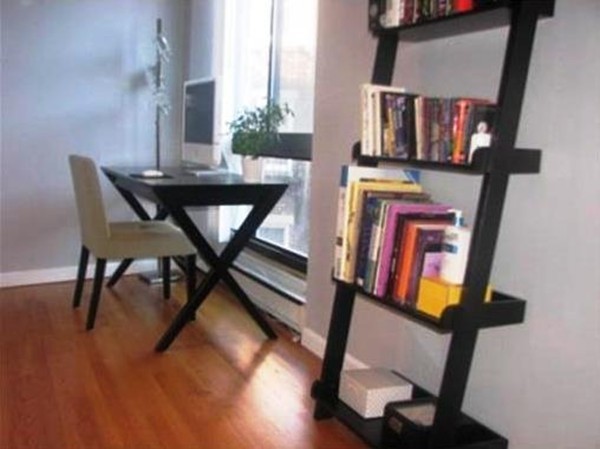 12 Stoneholm Street, Unit 520 Boston, MA 02115 - Photo 13 of 27 a view of a dining room with furniture and wooden floor
