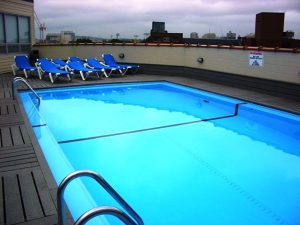 12 Stoneholm Street, Unit 520 Boston, MA 02115 - Photo 19 of 27 a view of a terrace with skyline