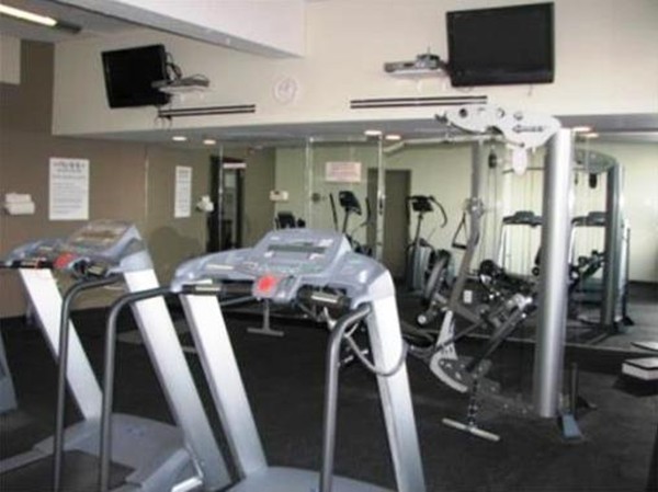 12 Stoneholm Street, Unit 520 Boston, MA 02115 - Photo 25 of 27 a view of a livingroom with furniture and a flat screen tv