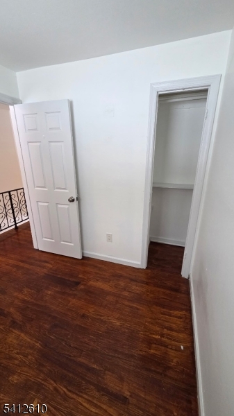 12 Ghost Pony Road, Unit B Andover, NJ 07821 - Photo 7 of 10 a view of an empty room with wooden floor and closet