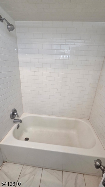 12 Ghost Pony Road, Unit B Andover, NJ 07821 - Photo 10 of 10 a bathroom with bathtub