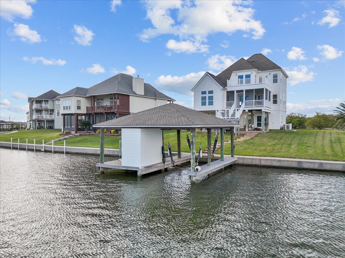 211 Tuna Run Freeport, TX 77541 - Photo 3 of 48 Private boathouse on a tranquil canal. Ideal for boating enthusiasts!