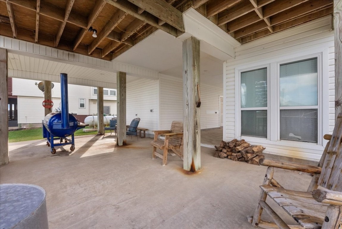 211 Tuna Run Freeport, TX 77541 - Photo 44 of 48 The area is ideal for outdoor entertaining and relaxation, with views of the canal.