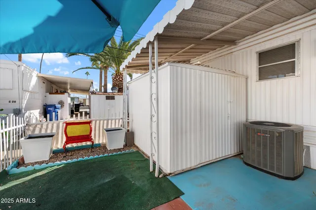 a view of an entryway with a small yard