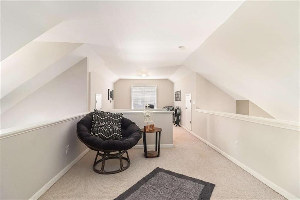2685 Mariner Way Villa Rica, GA 30180 - Photo 17 of 26 a room with furniture a rug and a window