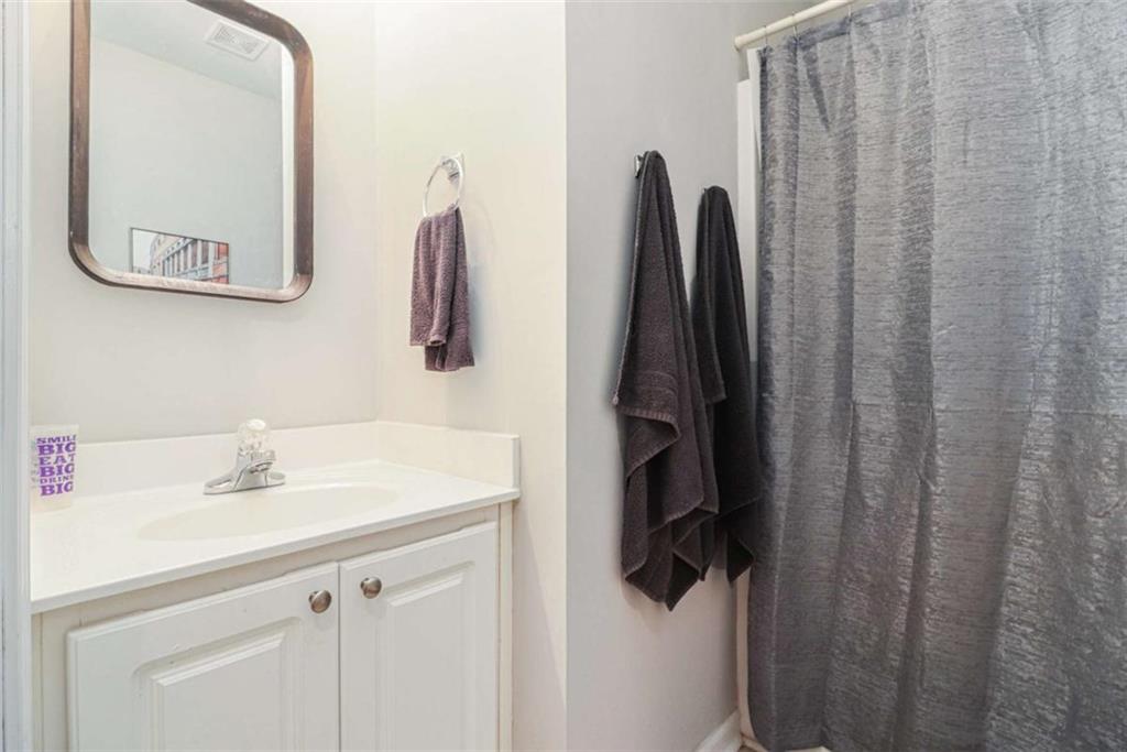 2685 Mariner Way Villa Rica, GA 30180 - Photo 18 of 26 a bathroom with a sink and a mirror