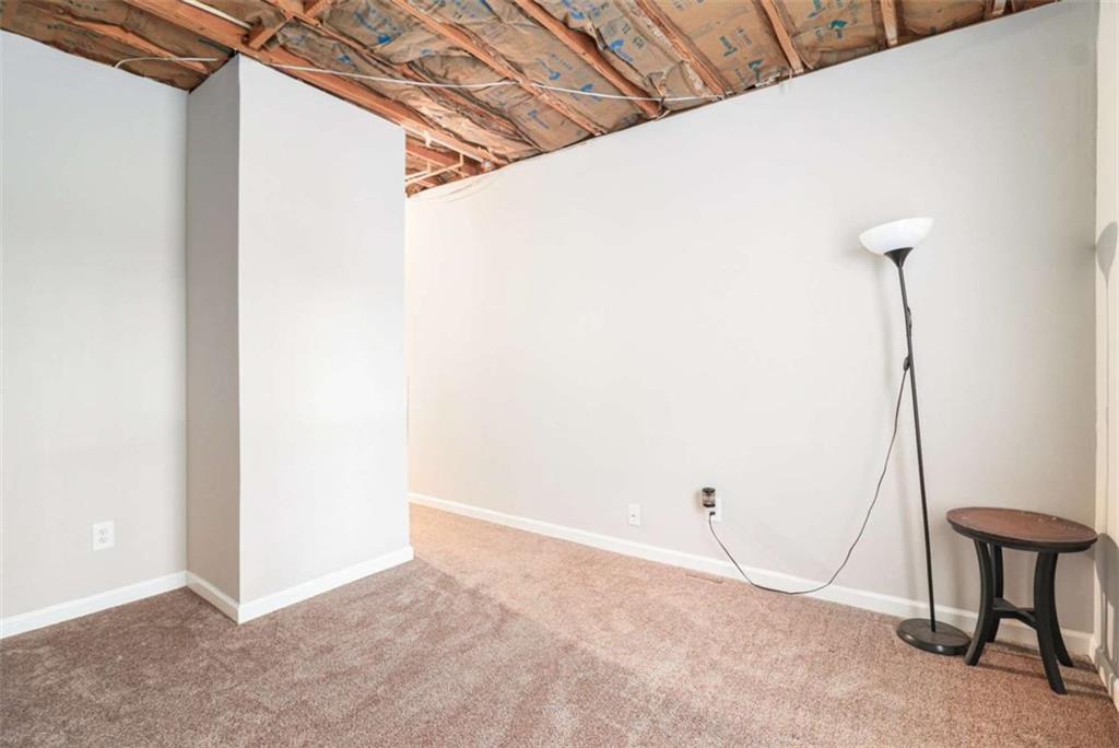 2685 Mariner Way Villa Rica, GA 30180 - Photo 19 of 26 a view of a room with rack on the wall