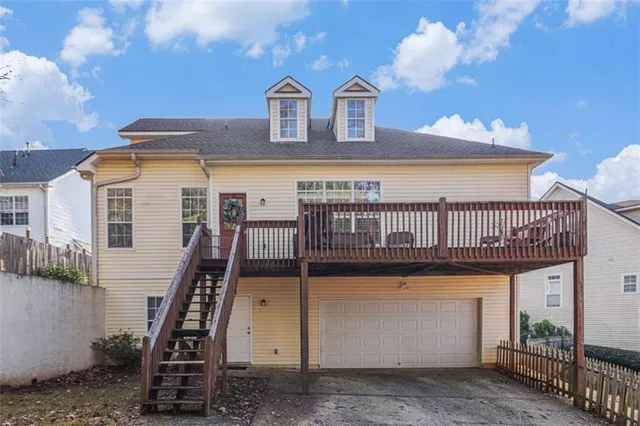 a view of a house with iron stairs