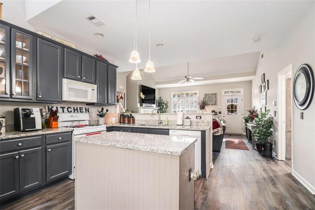 2685 Mariner Way Villa Rica, GA 30180 - Photo 7 of 26 a kitchen with sink cabinets and window