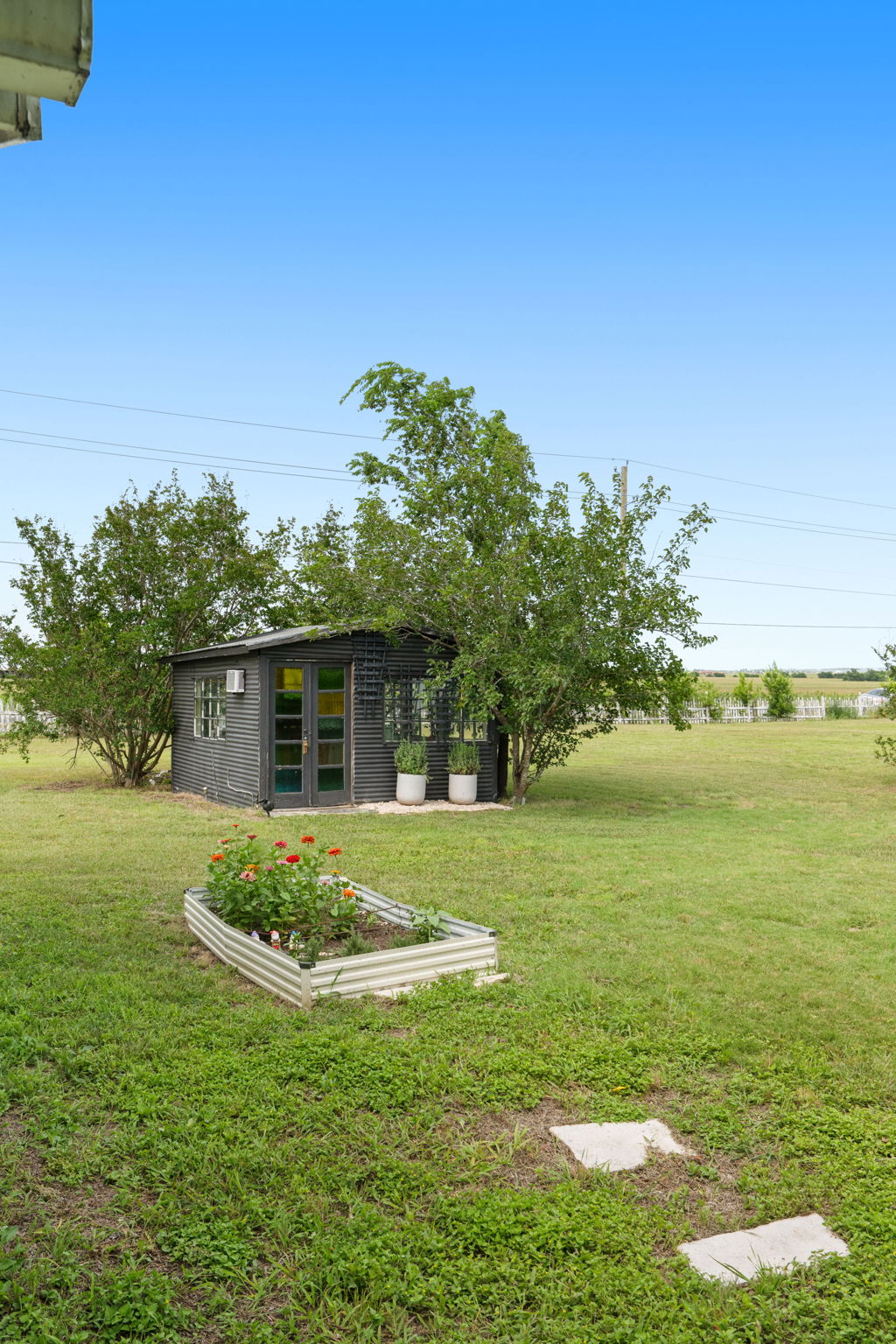17919 Manda Carlson Road Coupland, TX 78615 - Photo 27 of 40 a front view of a house with a yard