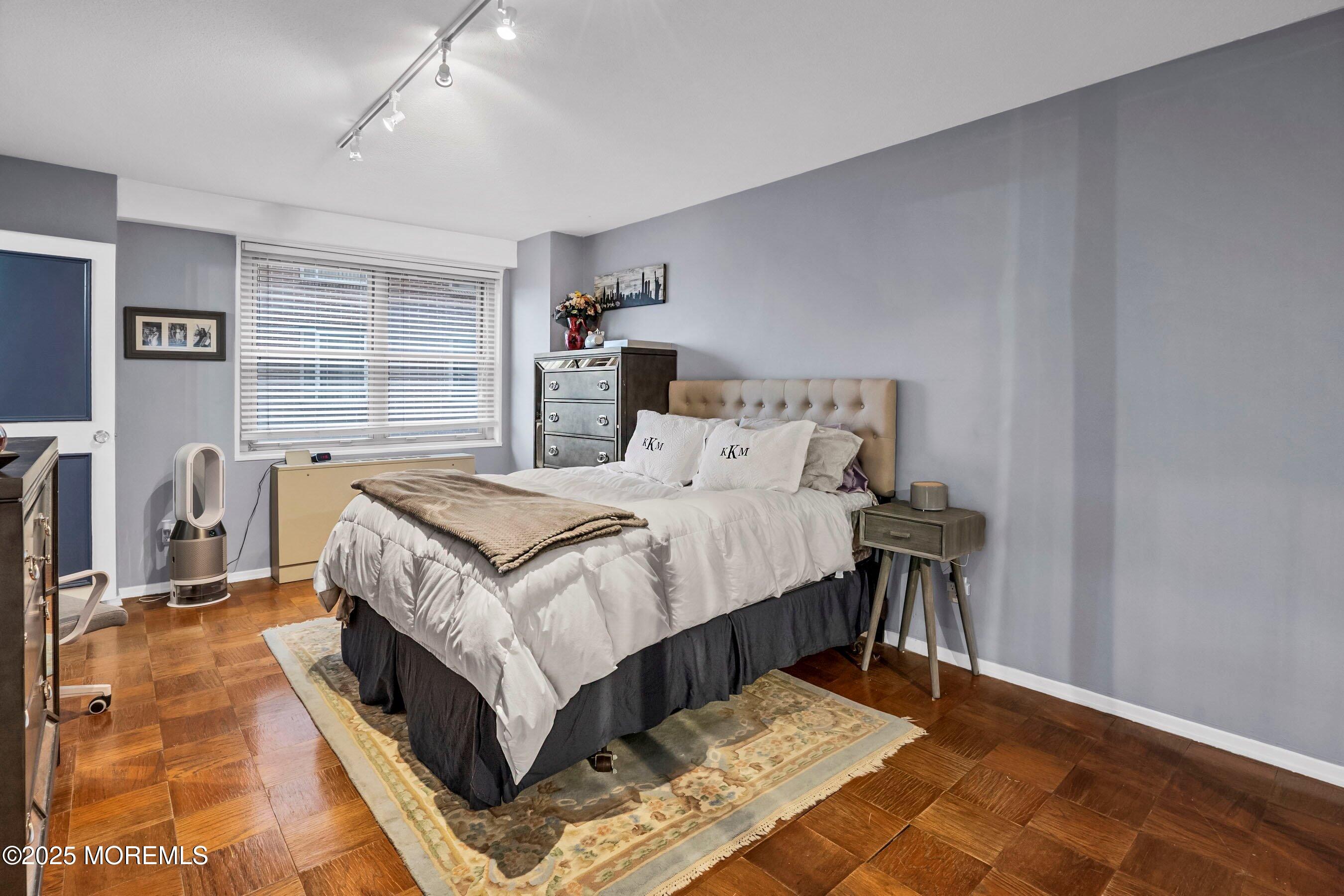 28 Riverside Avenue, Unit 1H Red Bank, NJ 07701 - Photo 16 of 55 Primary bedroom