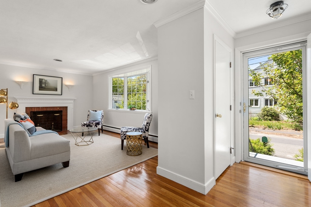 44 Hackensack Road Chestnut Hill, MA 02467 - Photo 4 of 13 a living room with furniture and a fireplace
