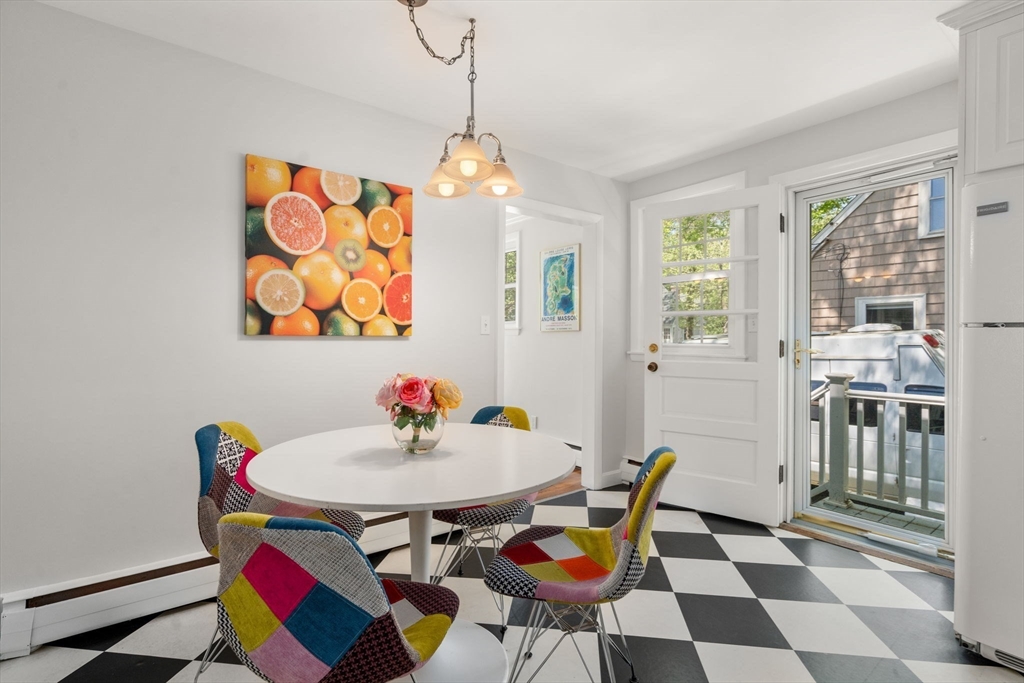 44 Hackensack Road Chestnut Hill, MA 02467 - Photo 5 of 13 a view of a dining room with furniture and a chandelier