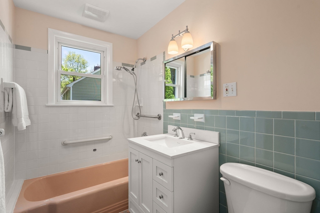 44 Hackensack Road Chestnut Hill, MA 02467 - Photo 8 of 13 a bathroom with a sink a toilet and a bathtub