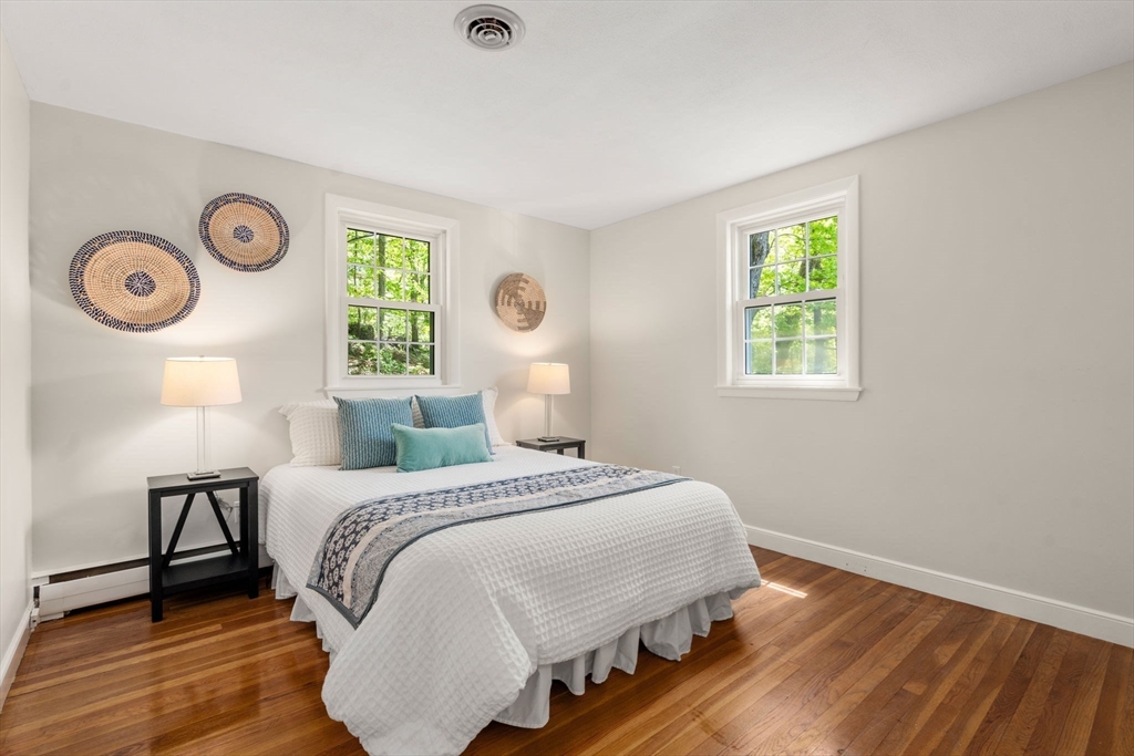 44 Hackensack Road Chestnut Hill, MA 02467 - Photo 10 of 13 a bedroom with a bed and a window