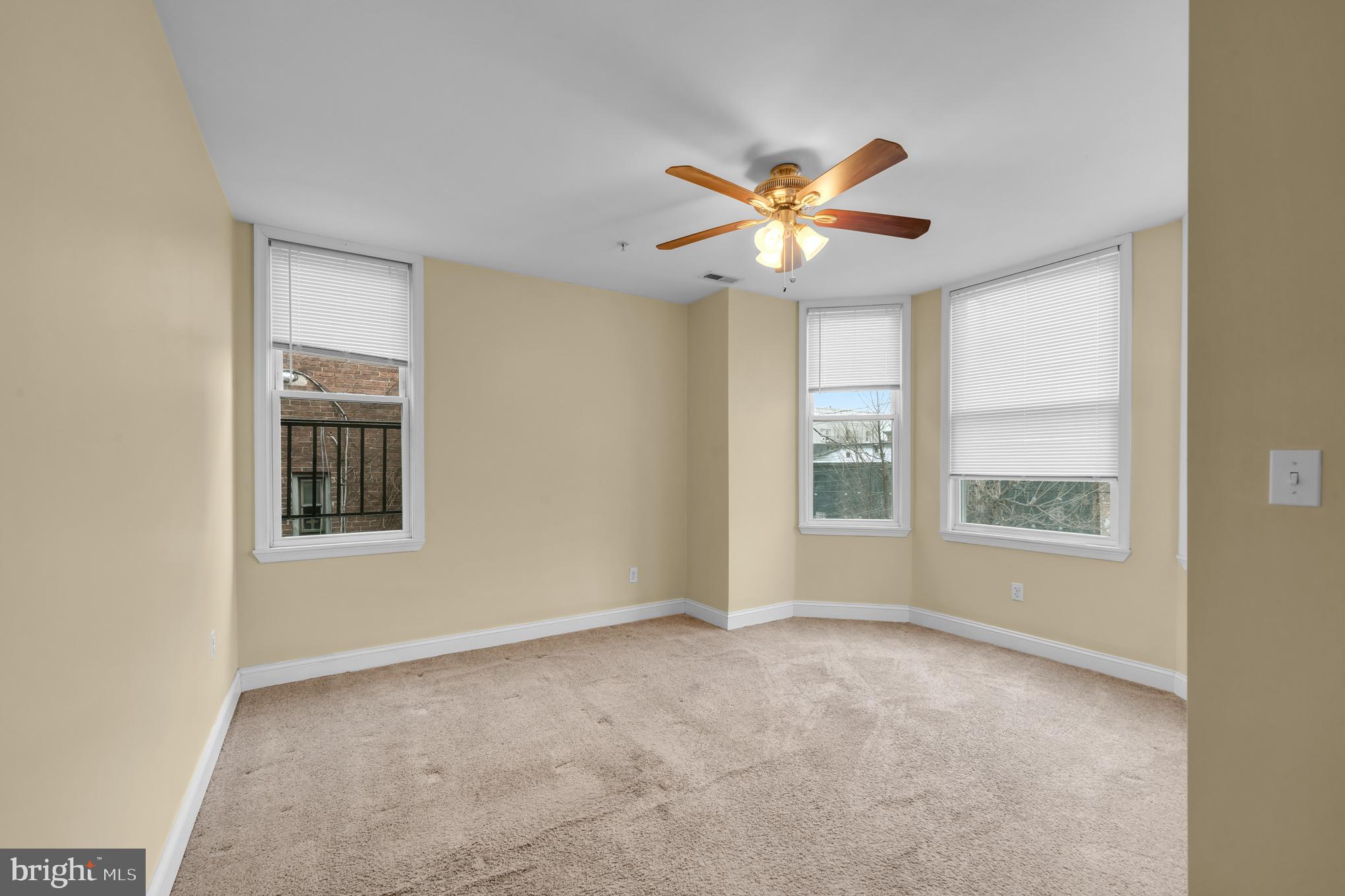 2210 North Charles Street Baltimore, MD 21218 - Photo 11 of 31 a view of an empty room with a window