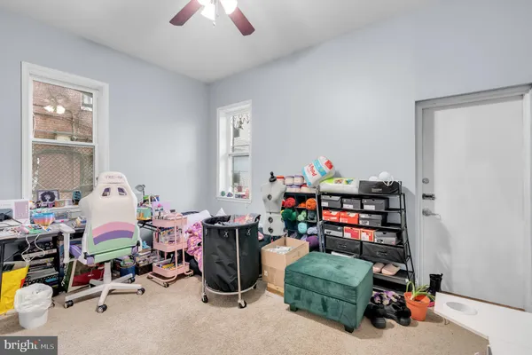 a living room with furniture and a toys