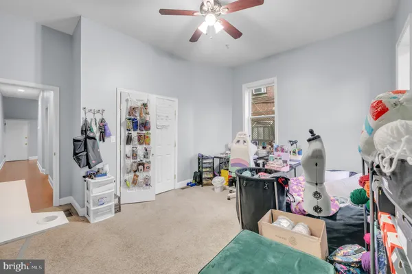 a view of a workspace with furniture and toys