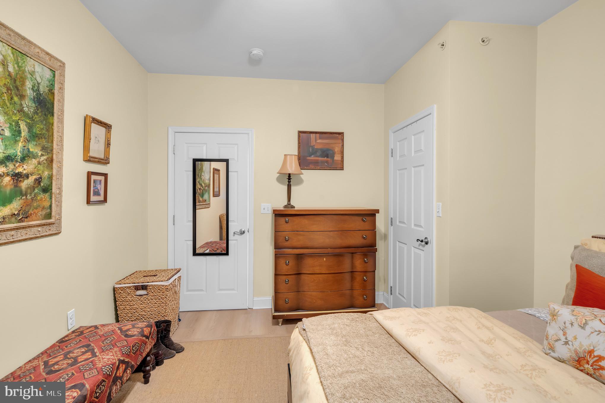 2210 North Charles Street Baltimore, MD 21218 - Photo 8 of 31 a bedroom with a bed and furniture