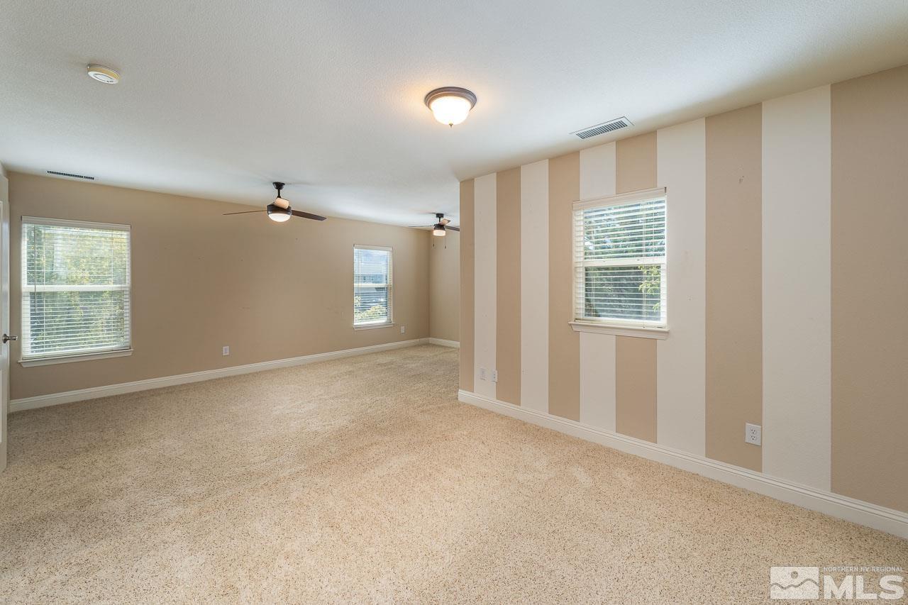 1935 Angel Ridge Drive Reno, NV 89521 - Photo 24 of 33 an empty room with windows and closet