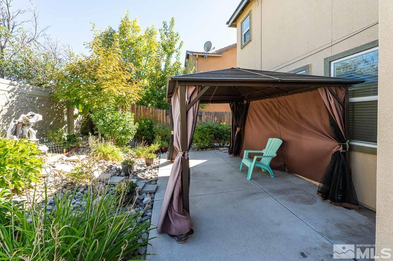 1935 Angel Ridge Drive Reno, NV 89521 - Photo 29 of 33 a view of patio with table and chairs and potted plants