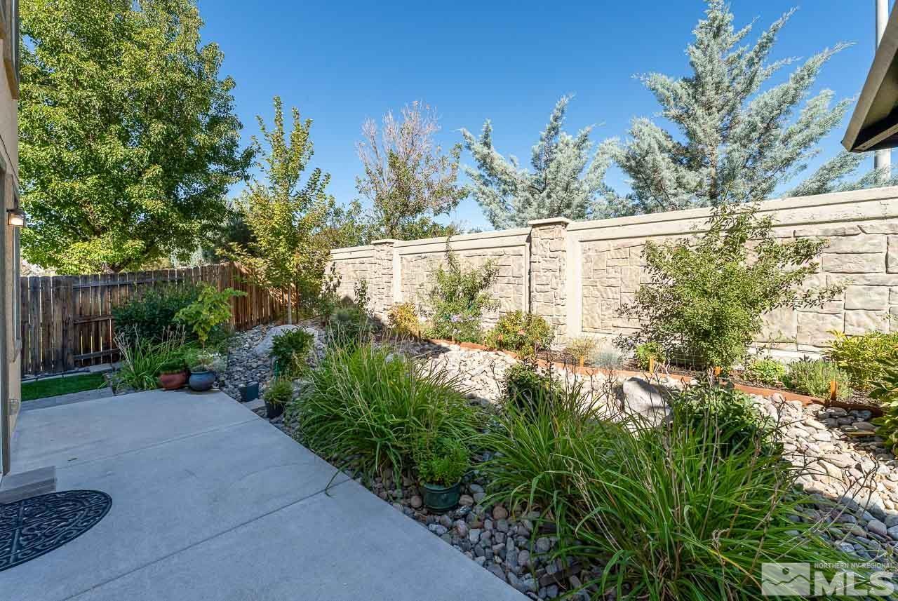 1935 Angel Ridge Drive Reno, NV 89521 - Photo 33 of 33 a view of a garden with a fountain