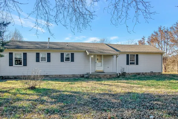a view of a house with a swimming pool