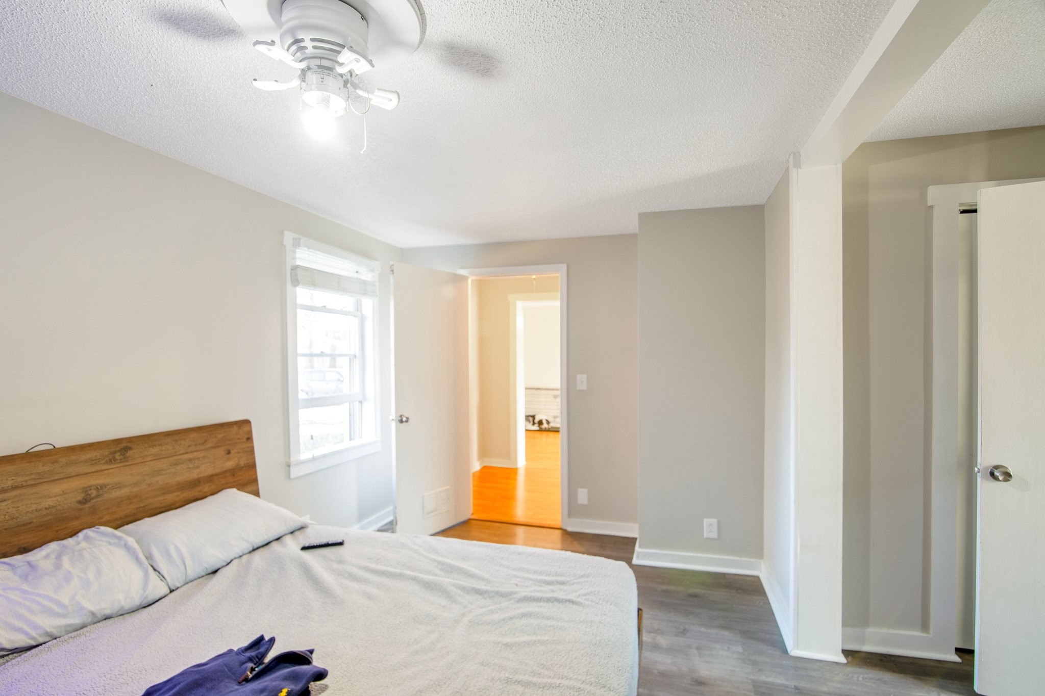 12252 Karo Road Bell Buckle, TN 37020 - Photo 11 of 25 a bedroom with a bed and a chandelier