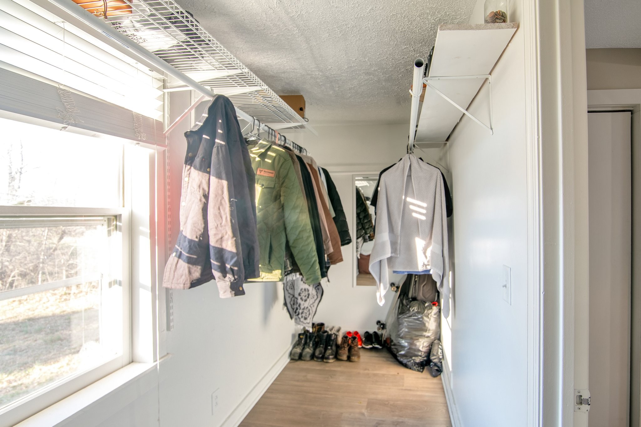 12252 Karo Road Bell Buckle, TN 37020 - Photo 12 of 25 a view of walk in closet with clothes and shoes