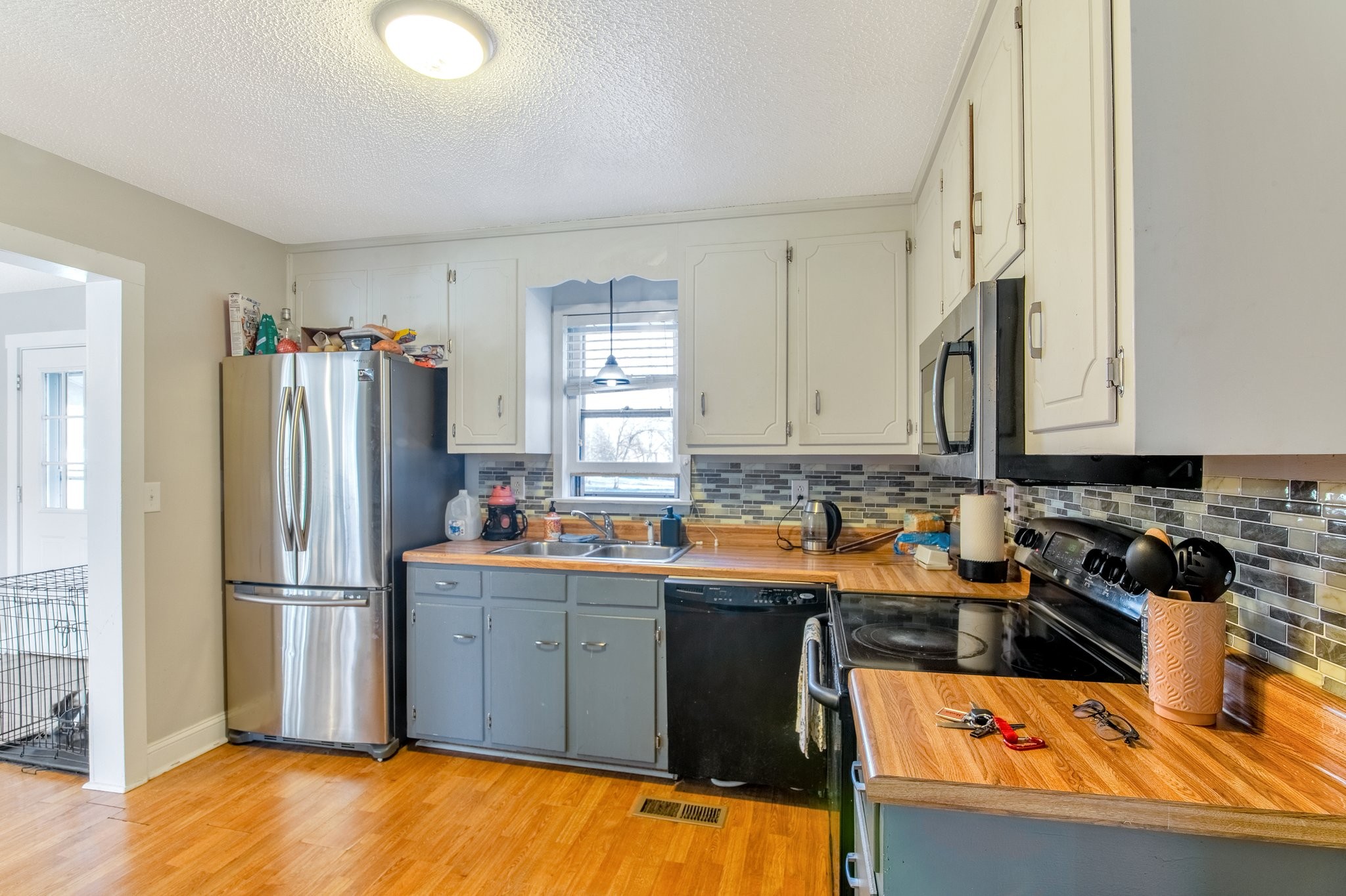 12252 Karo Road Bell Buckle, TN 37020 - Photo 2 of 25 a kitchen that has a cabinets and a stove