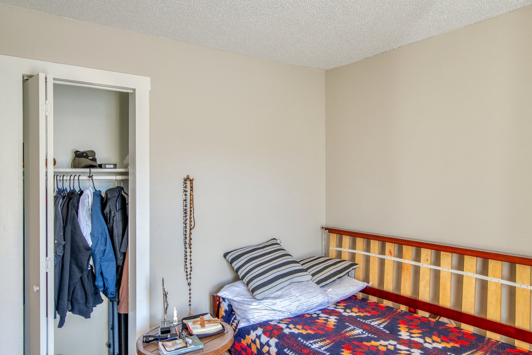12252 Karo Road Bell Buckle, TN 37020 - Photo 21 of 25 a bedroom with a bed and a book shelf