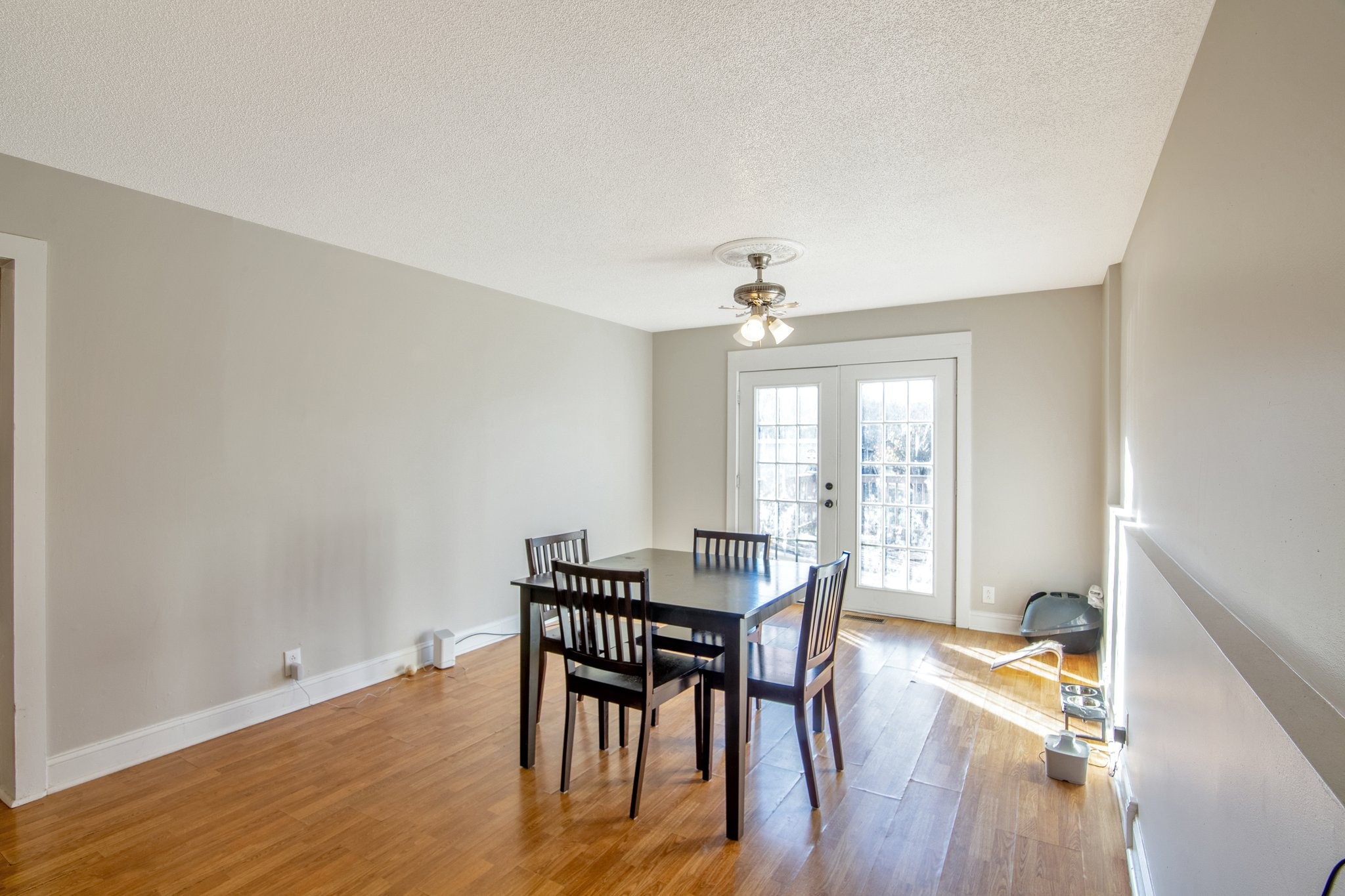 12252 Karo Road Bell Buckle, TN 37020 - Photo 4 of 25 a view of a dining room with furniture a chandelier and wooden floor