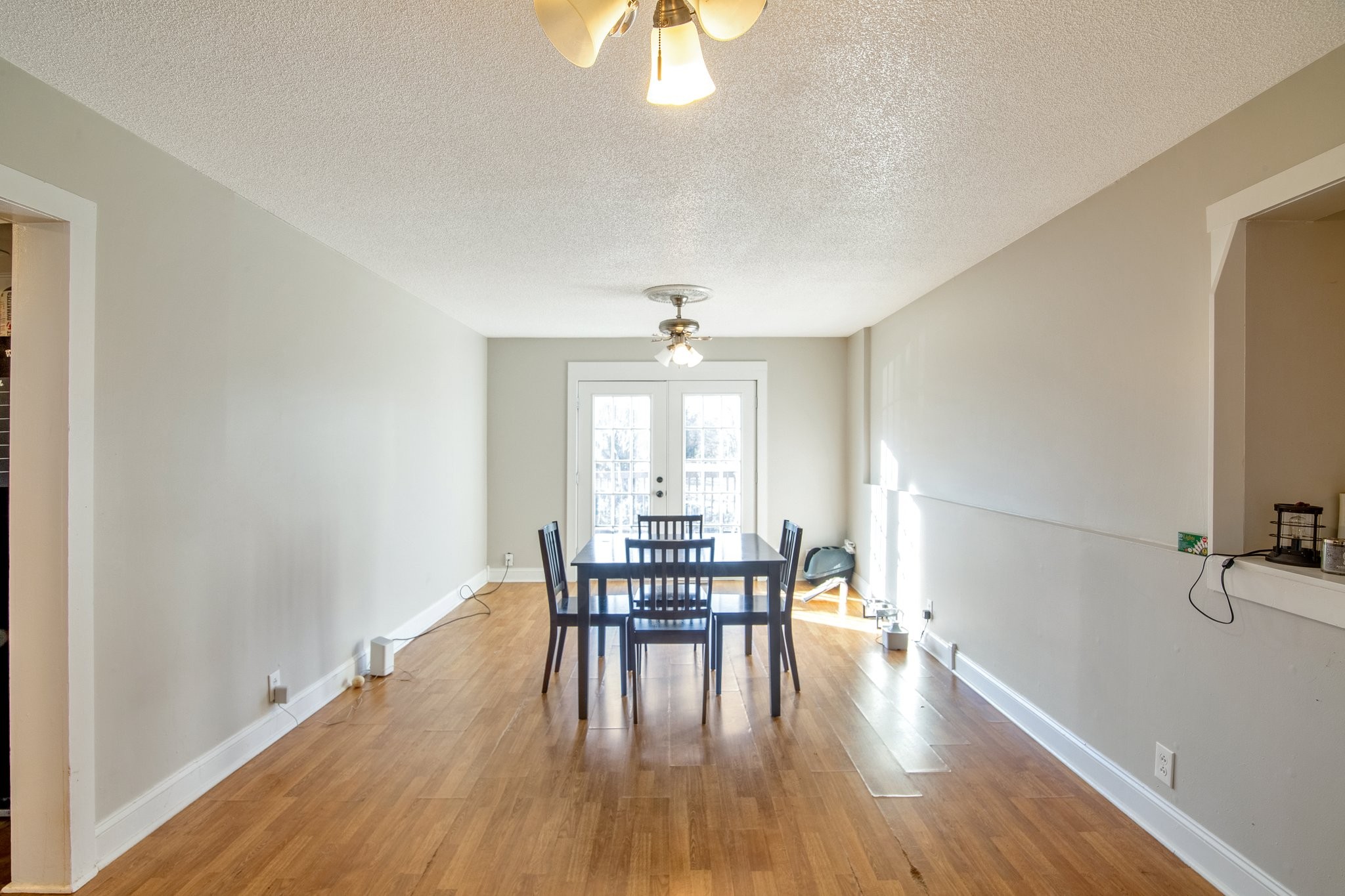 12252 Karo Road Bell Buckle, TN 37020 - Photo 5 of 25 a view of a dining room with furniture window and wooden floor