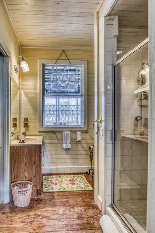 a view of a bathroom with bathtub