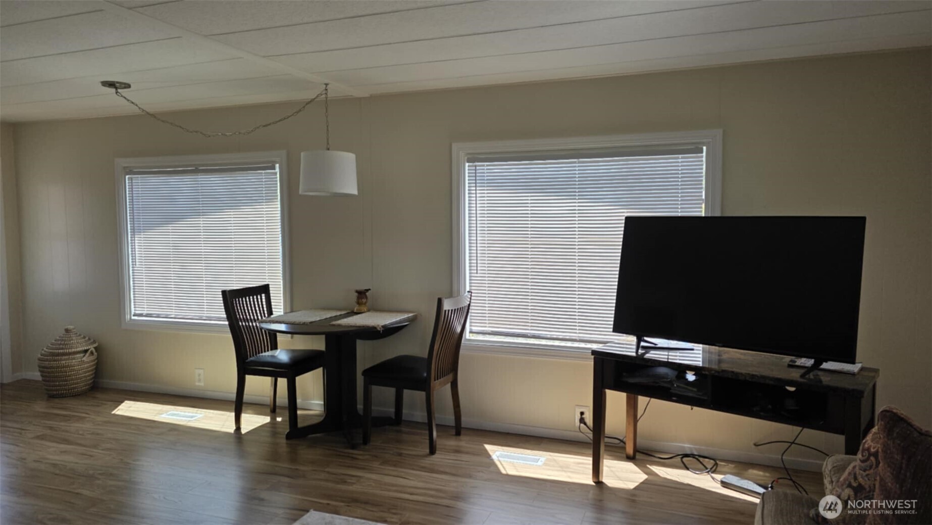 207 Ho Hum Lane Aberdeen, WA 98520 - Photo 13 of 22 a view of a workspace with furniture window and wooden floor