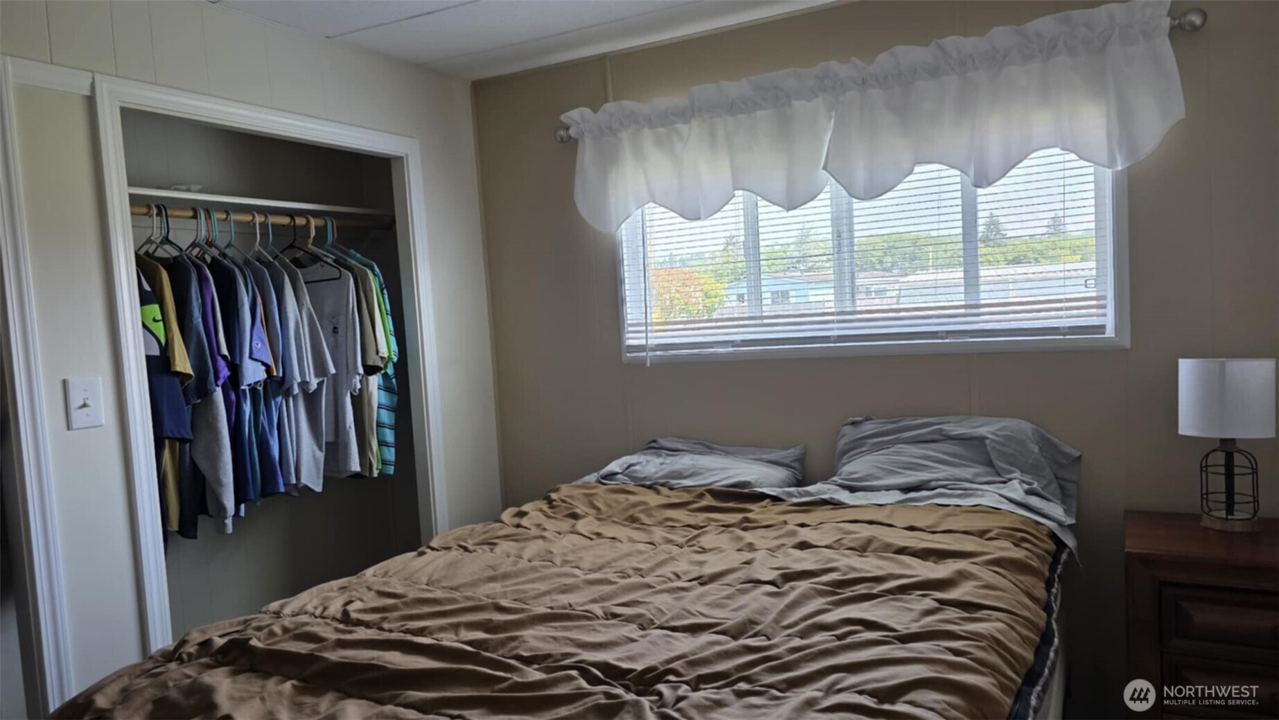 207 Ho Hum Lane Aberdeen, WA 98520 - Photo 18 of 22 a bedroom with a bed and a window