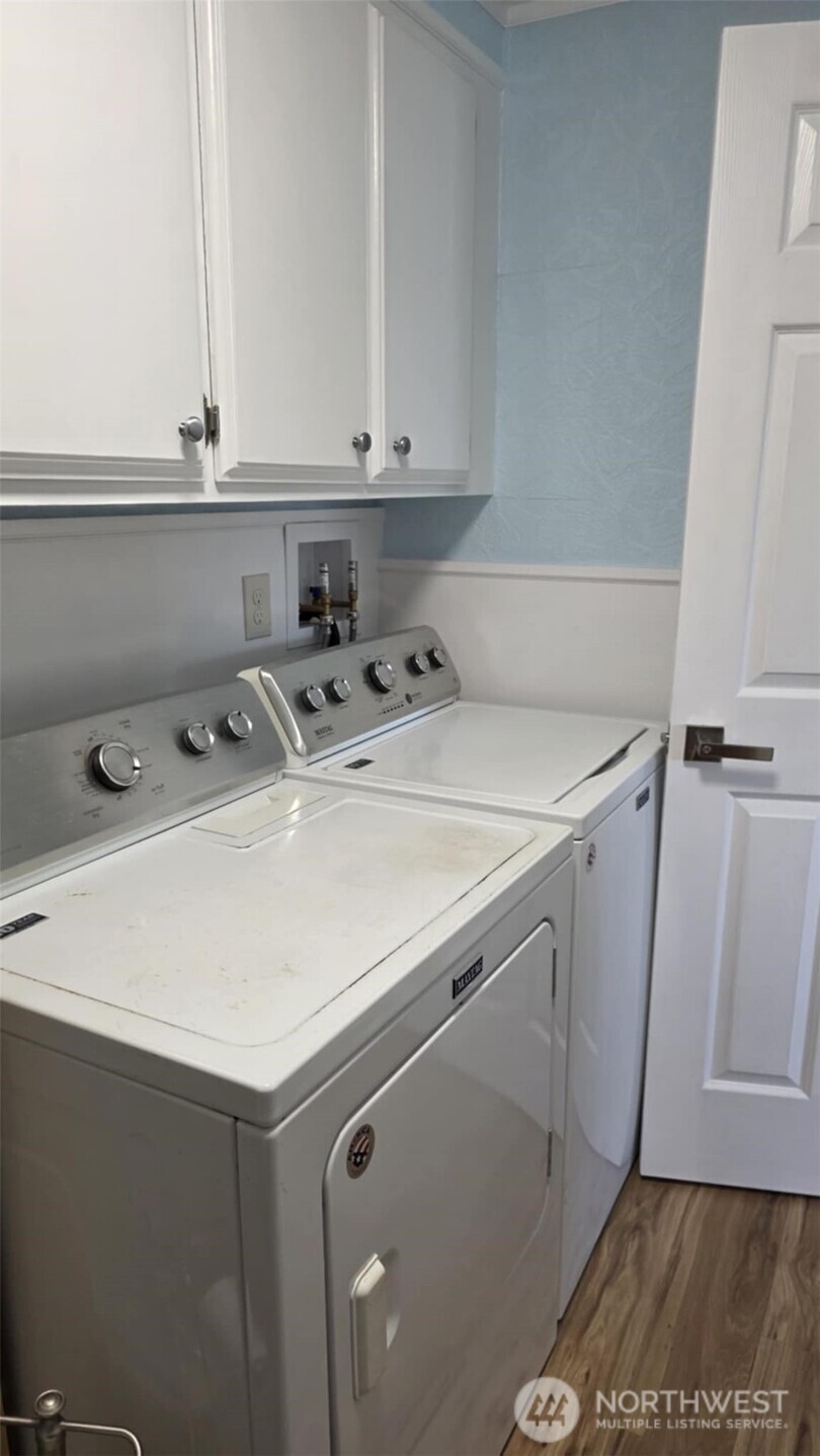 207 Ho Hum Lane Aberdeen, WA 98520 - Photo 22 of 22 a utility room with dryer and washer