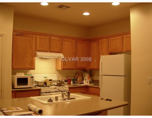 8986 Rutherford Grove Street Las Vegas, NV 89148 - Photo 4 of 7 Kitchen.